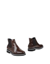Полусапоги и высокие ботинки Tods