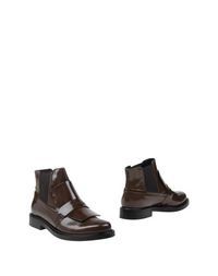 Полусапоги и высокие ботинки Tods