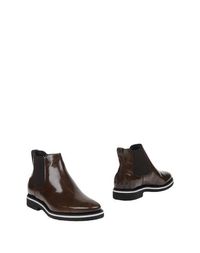 Полусапоги и высокие ботинки Tods
