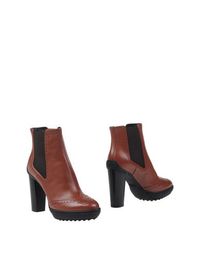 Полусапоги и высокие ботинки Tods