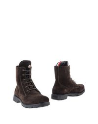 Полусапоги и высокие ботинки Moncler