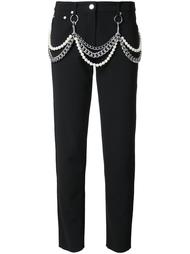 pearl and chain embellished trousers Moschino