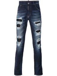 джинсы с рваными деталями Philipp Plein