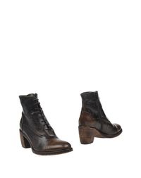 Полусапоги и высокие ботинки Tremp