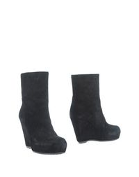 Полусапоги и высокие ботинки Rick Owens