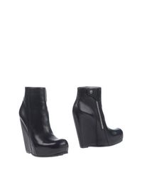 Полусапоги и высокие ботинки Rick Owens