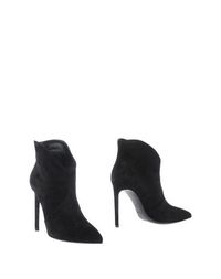 Полусапоги и высокие ботинки Saint Laurent