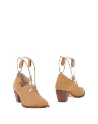 Полусапоги и высокие ботинки Charlotte Olympia