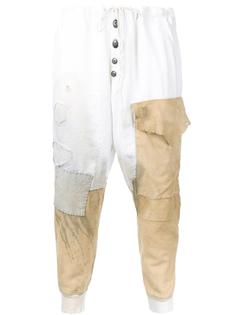 рваные спортивные штаны с заплатками Greg Lauren