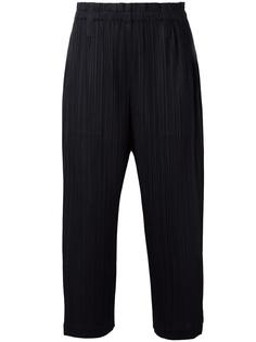 pleated tapered trousers Pleats Please By Issey Miyake