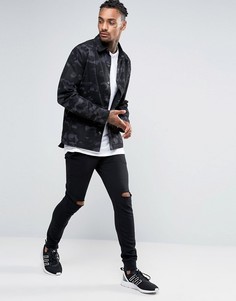 Суперузкие джоггеры с прорехами на коленях ASOS - Черный