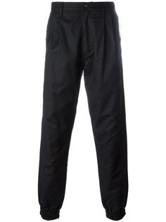зауженные брюки Maharishi