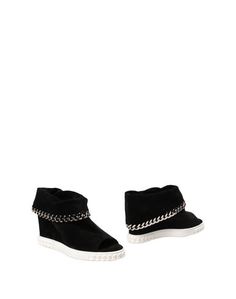 Полусапоги и высокие ботинки Casadei