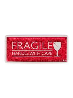 стикер 'Fragile'  Anya Hindmarch