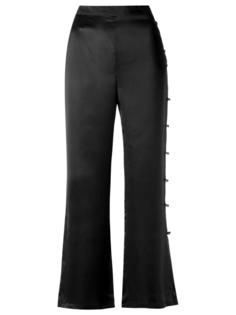 flared trousers Adriana Degreas