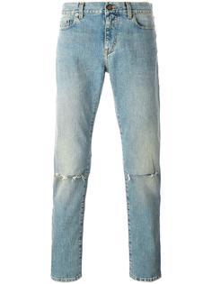 рваные джинсы кроя скинни Saint Laurent