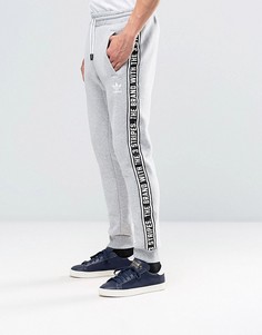 Серые джоггеры с отделкой лентой adidas Originals AY8268 - Серый