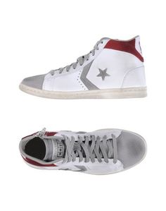 Высокие кеды и кроссовки Converse Cons