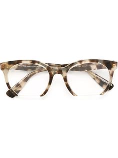 солнцезащитные очки в овальной оправе Miu Miu Eyewear