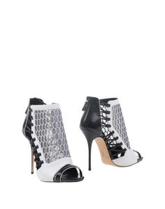 Полусапоги и высокие ботинки Casadei