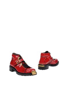 Полусапоги и высокие ботинки Miu Miu