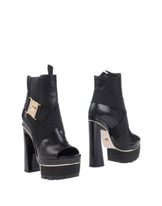 Полусапоги и высокие ботинки Versace