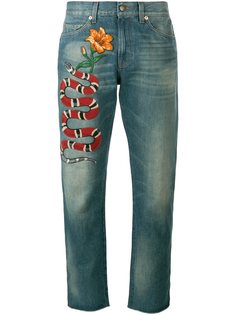 джинсы с вышивкой  Gucci