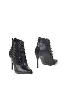 Полусапоги и высокие ботинки Guess