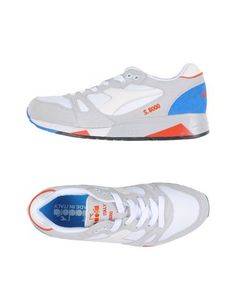 Низкие кеды и кроссовки Diadora