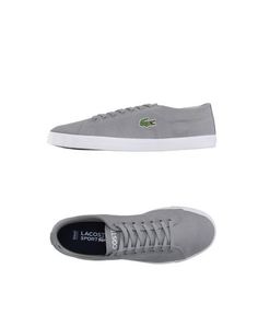 Низкие кеды и кроссовки Lacoste