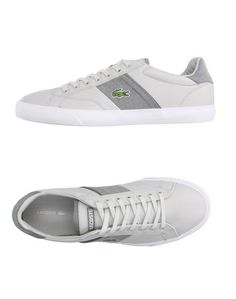 Низкие кеды и кроссовки Lacoste