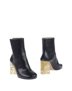 Полусапоги и высокие ботинки Maison Margiela 22