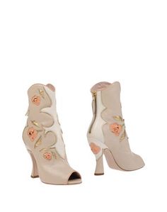 Полусапоги и высокие ботинки Miu Miu