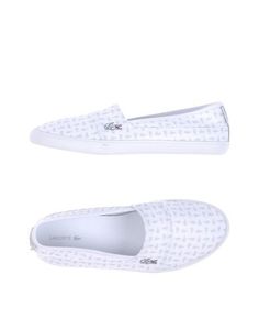 Низкие кеды и кроссовки Lacoste