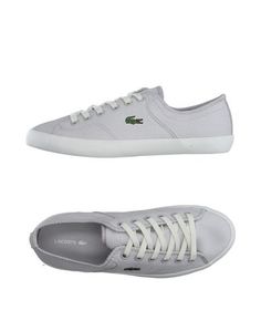 Низкие кеды и кроссовки Lacoste