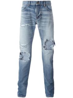 джинсы с потертым эффектом Saint Laurent