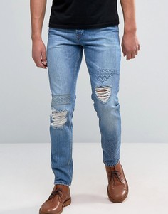 Выбеленные рваные джинсы слим с вышивкой ASOS - Синий