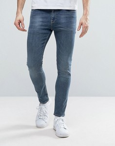 Синие выбеленные укороченные джинсы супероблегающего кроя ASOS - Синий