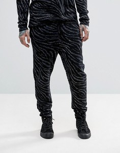 Трикотажные брюки с отделкой зебра металлизированной нитью ASOS - Черный