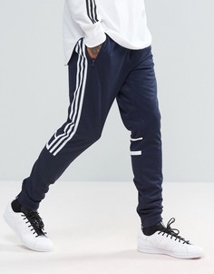 Темно-синие джоггеры adidas Originals CRL84 BK5928 - Темно-синий