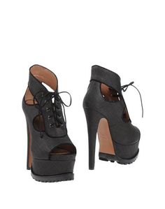 Полусапоги и высокие ботинки AlaÏa