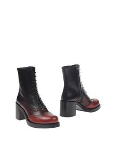 Полусапоги и высокие ботинки Miu Miu