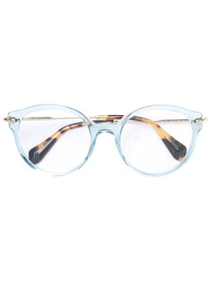 солнцезащитные очки круглой формы Miu Miu Eyewear