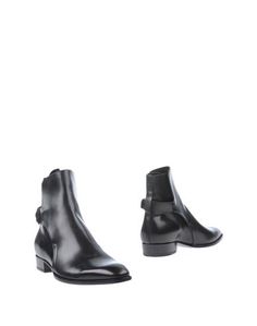 Полусапоги и высокие ботинки Saint Laurent