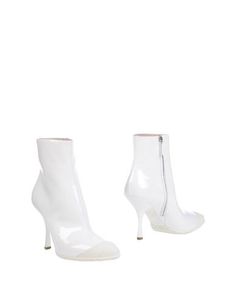 Полусапоги и высокие ботинки Miu Miu