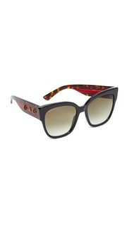 Крупные солнцезащитные очки тигровой расцветки Gucci