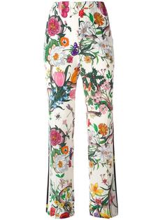 Flora Snake print trousers Gucci