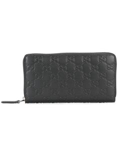 кошелек с монограммным тиснением Gucci