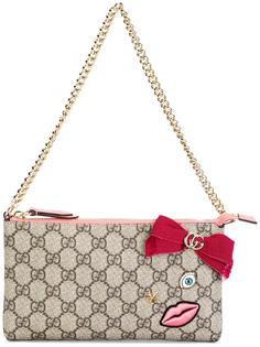 сумка-кошелек GG Supreme с вышитым лицом Gucci