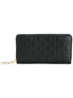 кошелек с тиснением логотипа Gucci